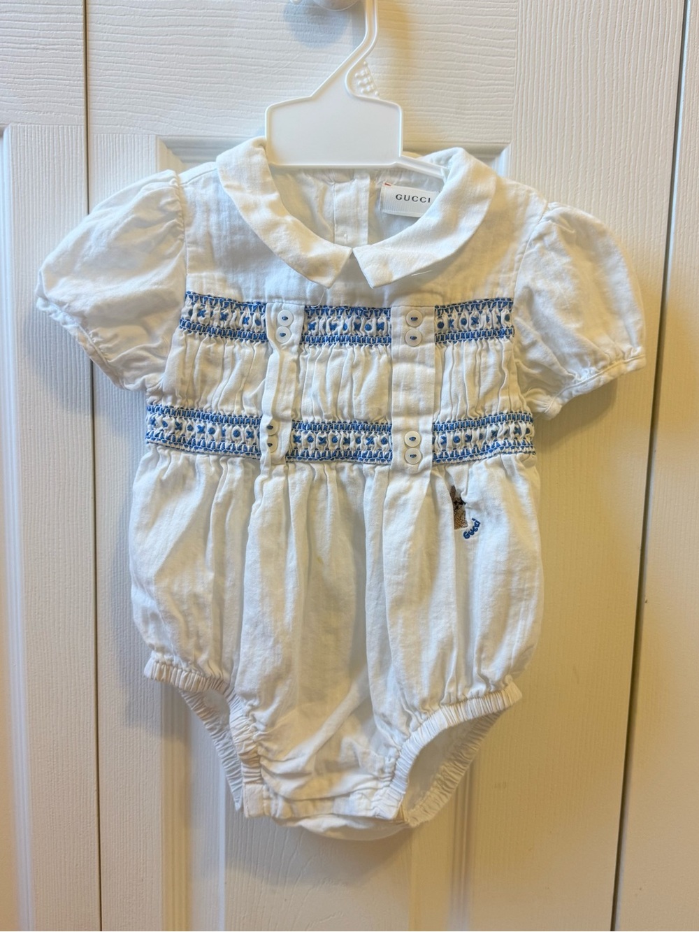 Gucci White Infant Smocked Romper with Blue Accents